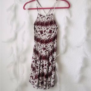 Brandi Melville one size mini zip up dress with cross back adjustable straps.